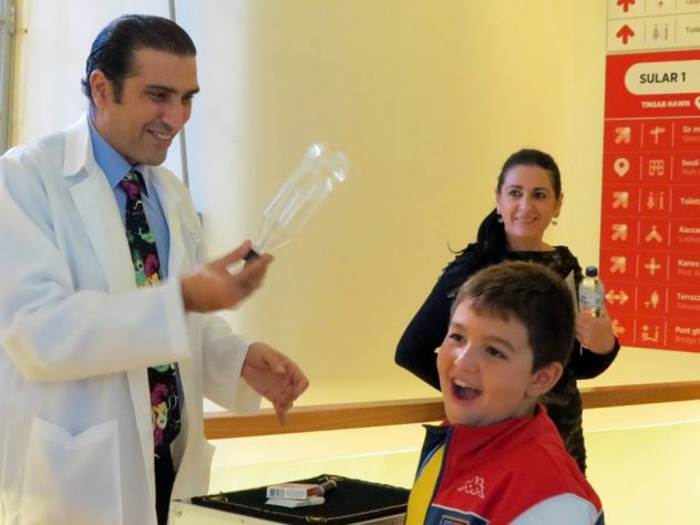 Magician in Malta performing science magic show for opening of Esplora in Malta